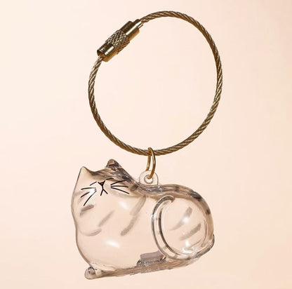💥 Buy 1 Get 1 Free — Transparent Pet Storage Capsule Keychains 🐶 & 🐱