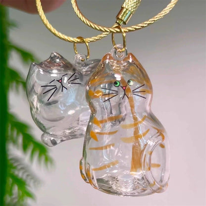 💥 Buy 1 Get 1 Free — Transparent Pet Storage Capsule Keychains 🐶 & 🐱